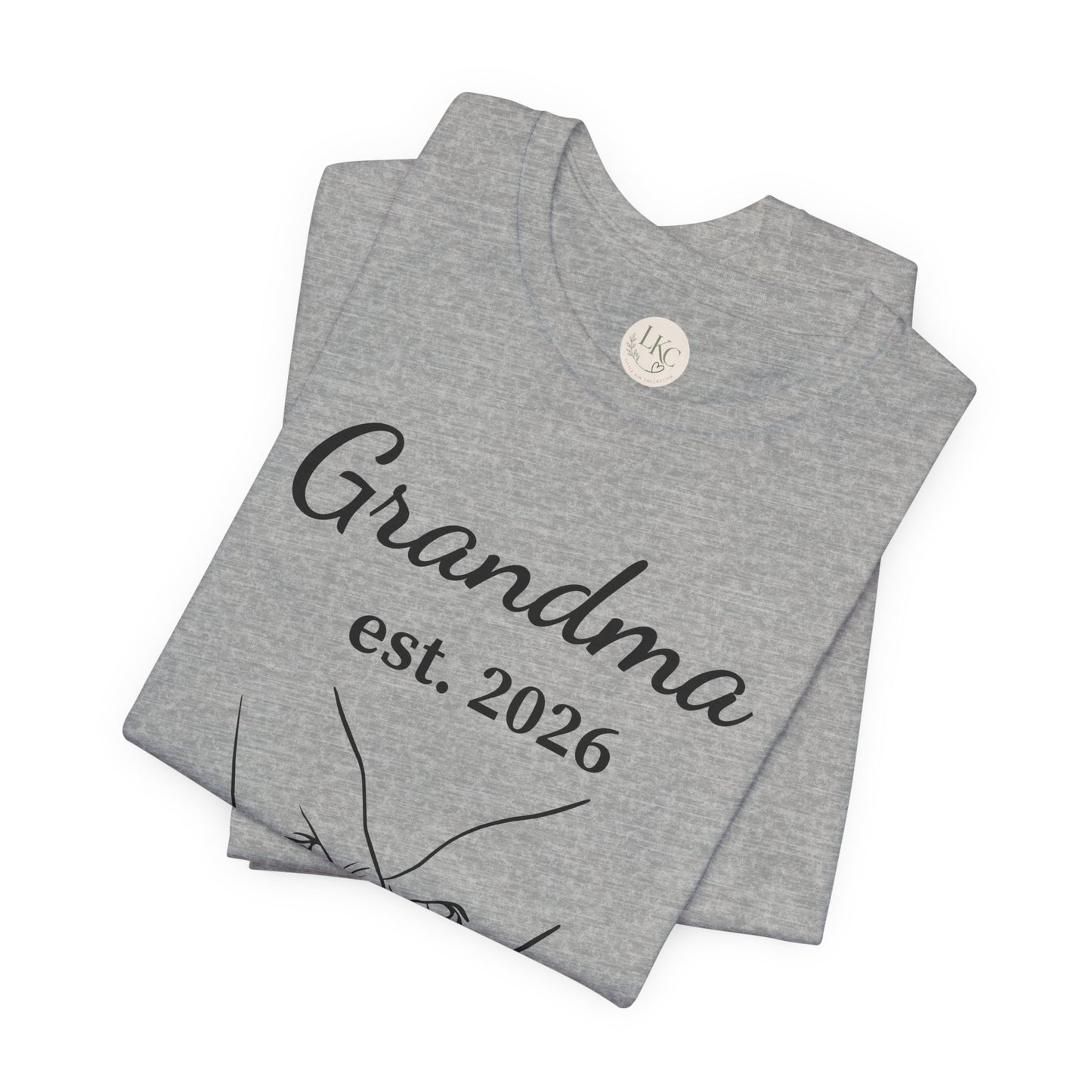 Grandma Est. 2026 T-Shirt — New Grandma Announcement Tee with Handholding Baby Illustration
