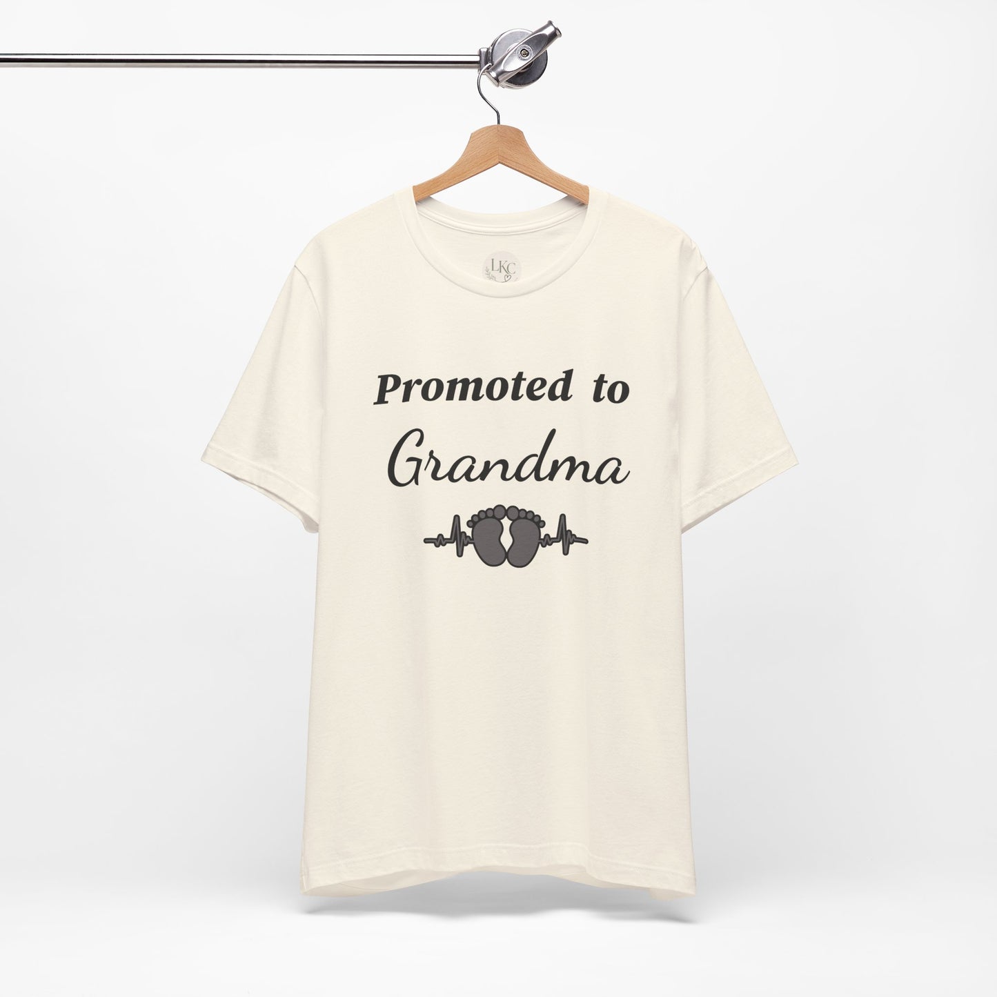 Promoted to Grandma T-Shirt — New Grandma Announcement Tee with Baby Feet Design