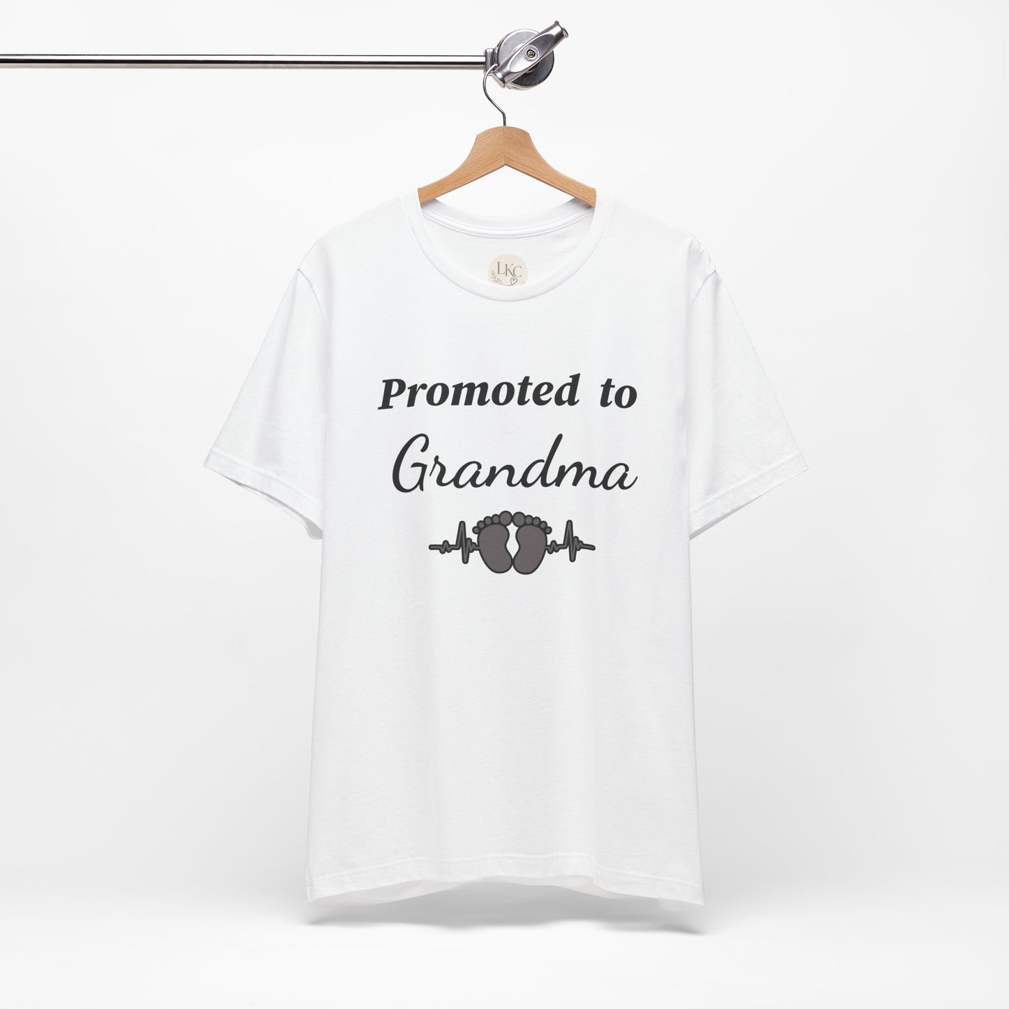 Promoted to Grandma T-Shirt — New Grandma Announcement Tee with Baby Feet Design